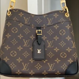 LOUIS VUITTON ODEON PM Logo bag. black leather strap and on edges. Pristine.